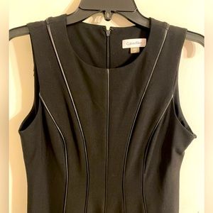 Black Calvin Klein dress. Never worn still has tags on it. Knee length.